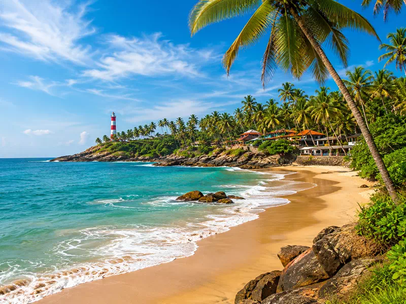 Kovalam Kerala beach holiday featuring tropical coastline and Arabian Sea views